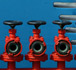 Photo of three oil refinery faucets