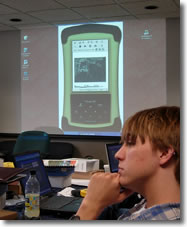 Photo of volunteer participating in a classroom training to use WIMS.  