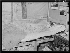 Young girl sick with influenza lying in bed.