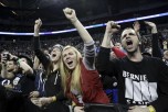 People cheer during a rally for Democratic presidential candidate Bernie Sanders at Key Arena in Seattle on March 20, 2016. (Jason Redmond/AFP/Getty Images)