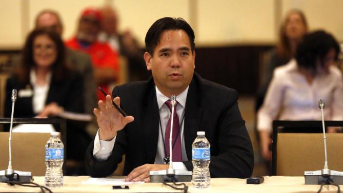 Utah Attorney General Sean Reyes addresses the Commission on Tuesday, May 19, 2015 in Salt Lake City.  (Jim Urquhart/AP Images for CECANF)