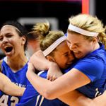 (Left to right) Minnetonka's Chrissy Carr, Courtney Fredrickson and Lizzie Odegard celebrate their 61-52 victory over Hopkins in the Class 4A championship game of the State Girls' Basketball Tournament. Photo by John Autey of the @pipress.