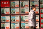 China's real estate agents say it's both the best time to buy and sell. (Peter Parks/AFP/Getty Images)