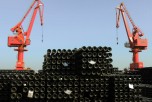 Steel pipes at a port in Lianyungang, eastern China's Jiangsu province, are being loaded for export on Dec. 1, 2015. (STR/AFP/Getty Images)