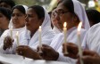 Pakistani nuns hold candles during a vigil in Lahore, Pakistan, March 28, 2016, for victims of a deadly suicide bombing. Pakistan's prime minister on Monday vowed to eliminate perpetrators of terror attacks such as the massive suicide bombing that targeted Christians gathered for Easter the previous day in the eastern city of Lahore, killing at least 70 people. (AP Photo/K.M. Chaudary)