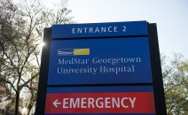 A sign designates an entrance to the MedStar Georgetown University Hospital in Washington, Monday, March 28, 2016. Hackers crippled computer systems at a major hospital chain, MedStar Health Inc., on Monday, forcing records systems offline for thousands of patients and doctors. The FBI said it was investigating whether the unknown hackers demanded a ransom to restore systems. (AP Photo/Molly Riley)