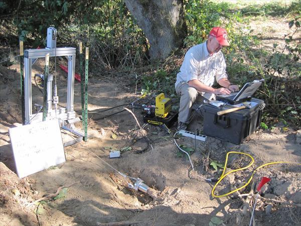 Man conducting research regarding levee vegetation