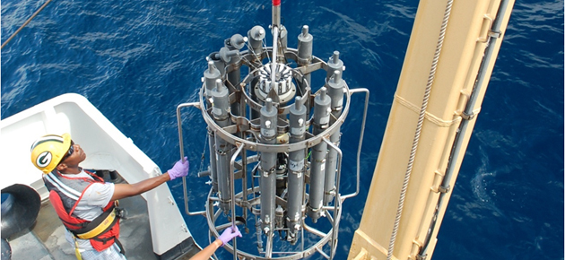 CTD device detects how the conductivity and temperature of the water column changes relative to depth. Bottles mounted on the rosette are also used to collect water samples at different depths. Credit: NOAA.