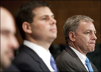 Goldman Sachs executives David Viniar, right, and David Lehman, center, testify at a Financial Crisis Inquiry Commission hearing on the role of derivatives in the financial crisis.