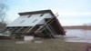 VIDEO: Extreme weather sends a two-story Ohio home toppling into a river. 