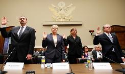 Lerft to right: Richard Bitner, Managing Director of Housingwire.com, Patricia Lindsay, former Vice President of corporate risk at the New Century Financial, Susan Mills, Managing Director of mortgage finance at Citi Markets and Banking, Global Securitized Markets and Richard Bowen, former Senior Vice President and business chief underwriter at CitiMortgage, are sworn in during a hearing before the Financial Crisis Inquiry Commission April 7, 2010 .