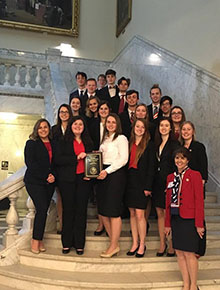 Photo of Ashely and students from the Boonsboro High School State Championship We the People Team 