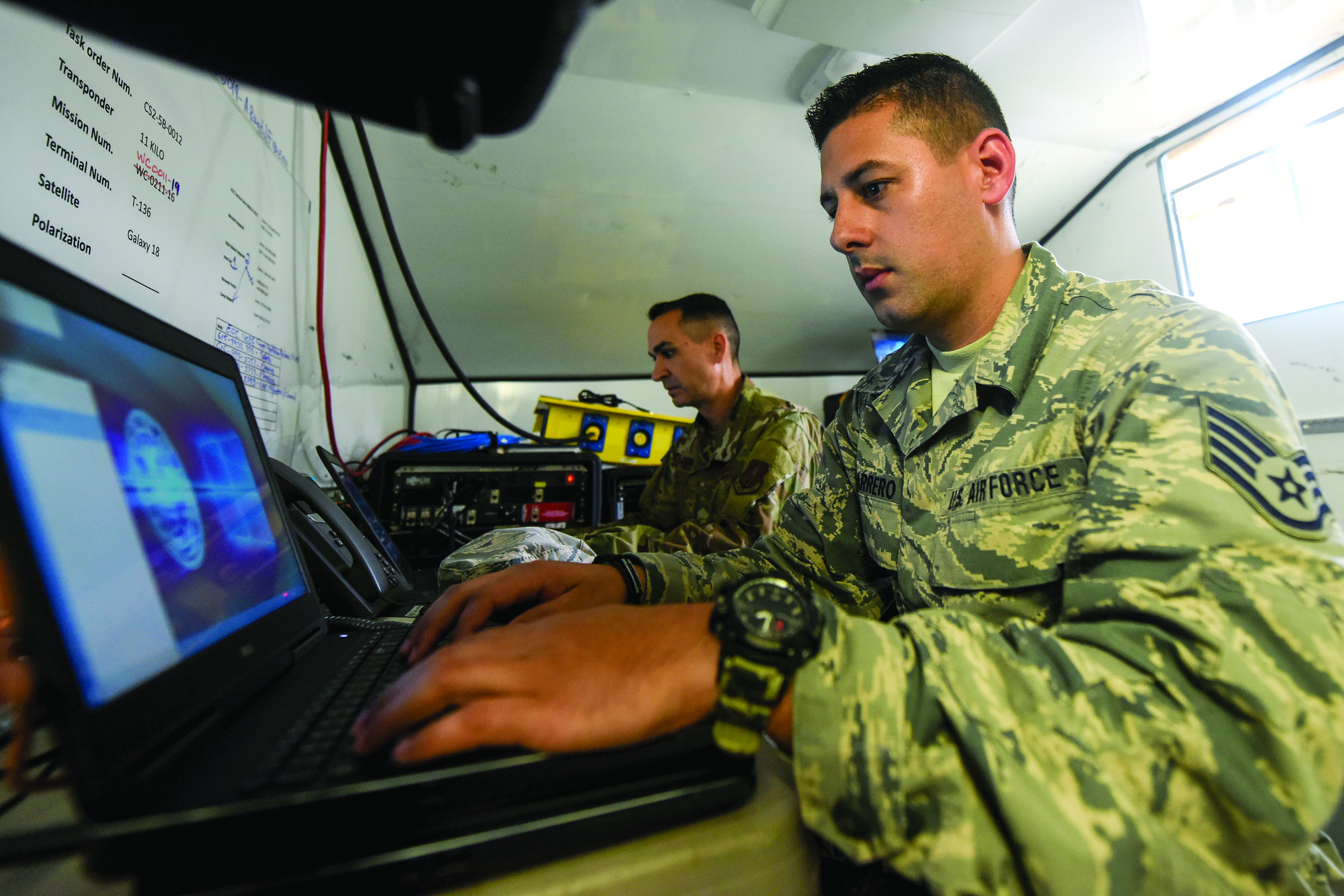 Source: DoD, An Air National Guard staff sergeant works at a command and control center in Cayey, Puerto Rico.