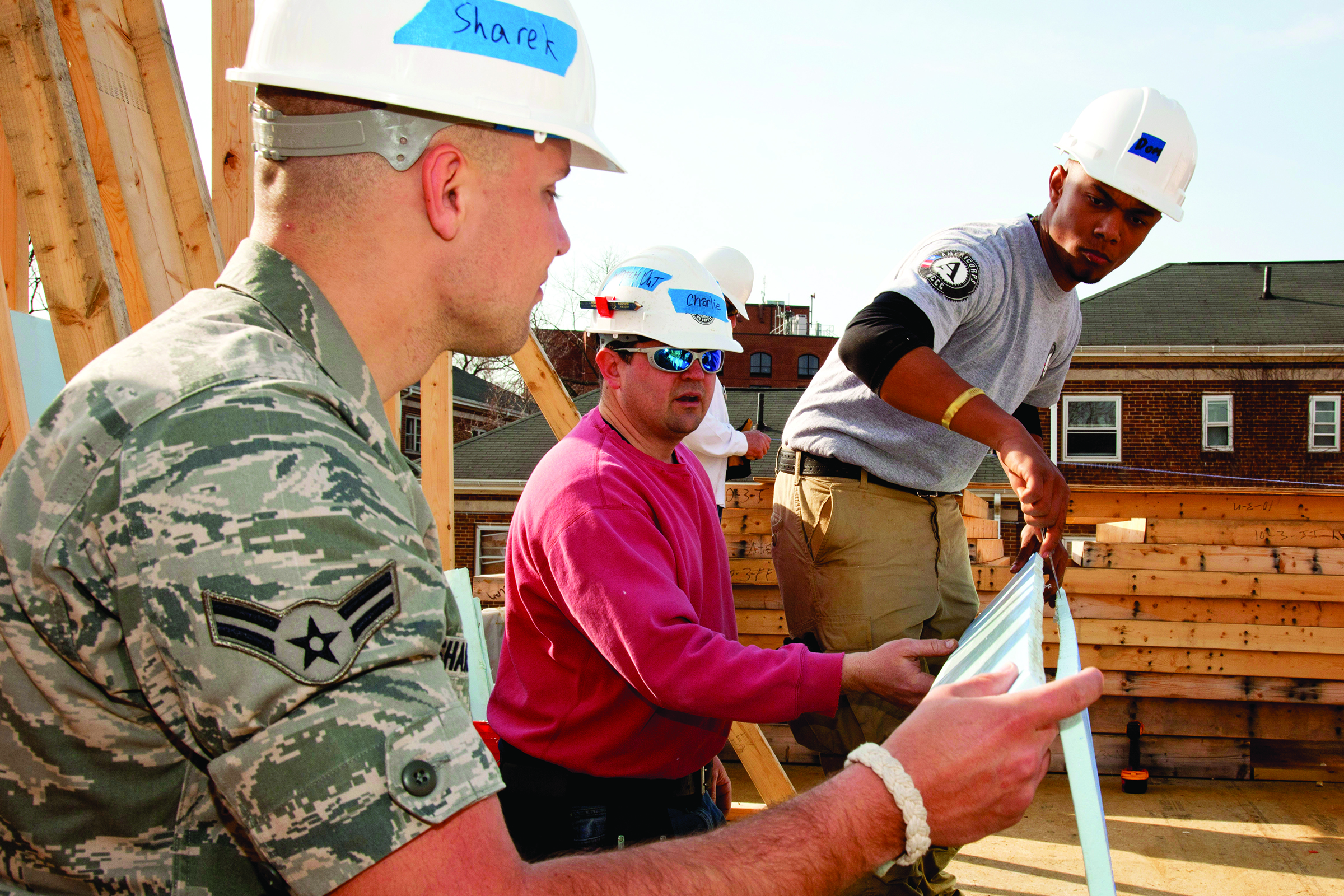 Source: Habitat for Humanity, Military and national service members build homes
together in Annapolis, Maryland.