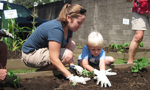 Malachi Roy is just one of many embassy children who have learned to grow vegetables in the People's Garden.