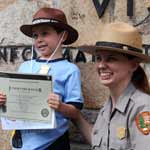Children can earn a Junior Ranger badge by participating in ranger-guided programs.