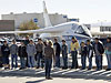 A Dryden tour guide speaks to a group of students touring Dryden.