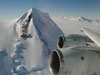 Near-vertical peaks and pinnacles often rose higher than NASAs DC-8 flying laboratory during low-level data-gathering flights in the Operation IceBridge campaign.