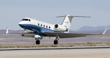 NASAs Gulfstream-III research testbed lifts off from the Edwards Air Force Base runway with the UAV synthetic aperture radar pod under its belly.
