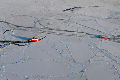 The Healy, left, a Coast Guard icebreaker, carves a path in the frozen Bering Sea for the Renda, a Russian tanker carrying 1.3 million gallons of emergency gasoline and diesel for Alaska. Shipping delays and a major storm prevented Nome's winter supply of fuel from arriving in early fall.