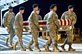 Army soldiers transfer the remains of Army Spc. Christopher A. Patterson on Dover Air Force Base, Del., Jan. 8, 2012. Patterson was assigned to the 713th Engineer Company, Indiana National Guard. U.S. Air Force photo by Roland Balik