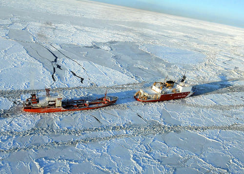 CGC Healy breaks ice for Russian tanker