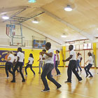 Students at the Oconaluftee Job Corps Civilian Conservation Center in Cherokee practice their choreography for a new student-produced fitness video. 