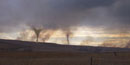 Smoke tornadoes created from spring prairie burns at the preserve.