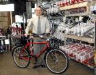 Wayne Sosin, the president of Worksman Cycles, shows off one of his company's bikes.