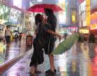 
As Hurricane Irene begins to hit the area, Amie Dellinger and Tom Hayes, both visitors of Rochester, embraced in the rain as some reveled in the event by dancing and cavorting in Times Square Saturday, August 27, 2011.