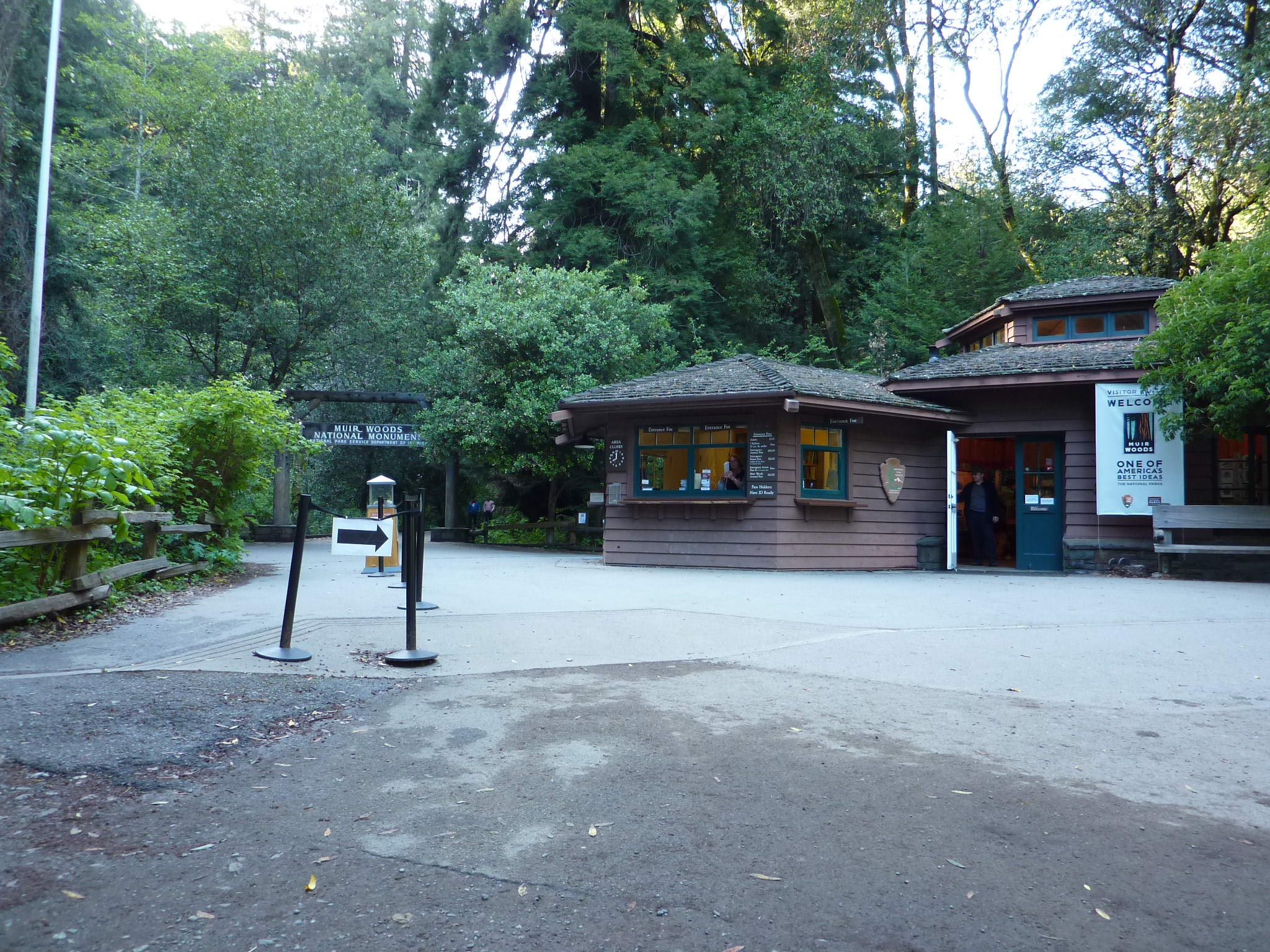 Photo of the Muir Woods Visitor Center and entrance arch. 