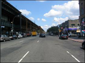 The rezoning area has many wide corridors, including White Plains Road, pictured, with the 2 and 5 Elevated Train 