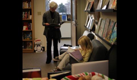 Browsing through books at the CCYAL Open House