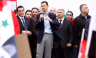 Bashar Assad addresses supporters during a rally at a central square in Damascus, Syria