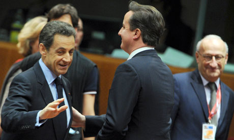 Nicolas Sarkozy and David Cameron before the start of a session during the European Union summit