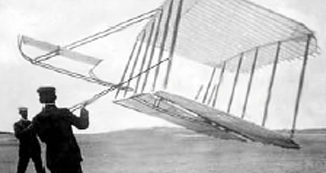 Orville Wright takes off on the first successful airplane flight