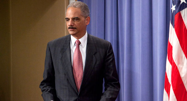 Eric Holder arrives at a press conference for a lawsuit concerning the Deepwater Horizon oil spill. | AP Photo