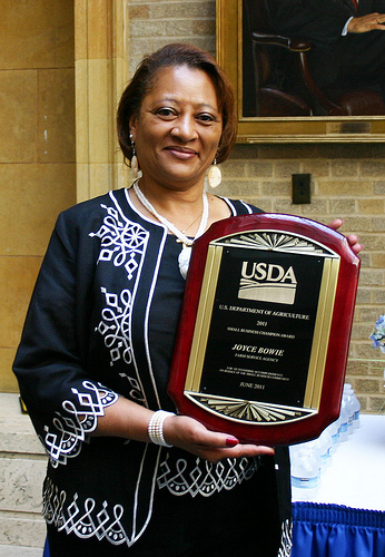 Director of Contracting Activity Designee Joyce Bowie with her award.  
