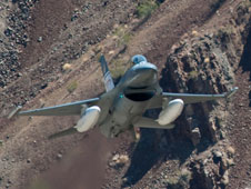 The Air Force F-16D ACAT aircraft flew at low levels through canyons and past peaks of the Sierra Nevada mountains