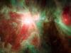 This image from NASA's Spitzer Space Telescope shows what lies near the sword of the constellation Orion -- an active stellar nursery containing thousands of young stars and developing protostars