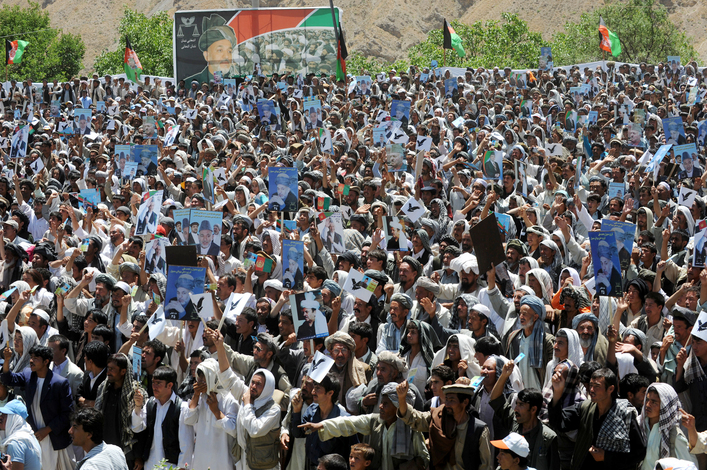 Several thousand people from Baghlan Province, invited by religious leader Sayed Mansour Nadiri, gather at a rally for Afghan President Hamid Karzai in Dar-e-Kayan, Afghanistan.