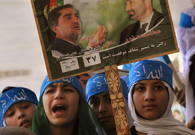 A group of young girls attend a rally for Afghan presidential candidate Dr. Abdullah Abdullah in Maymana, the capital of Faryab Province in Northern Afghanistan.
