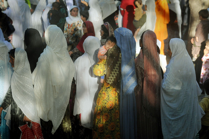 Afghan women gather, at the invitation of religious leader Sayed Mansour Nadiri, for a rally in support of President Karzai.