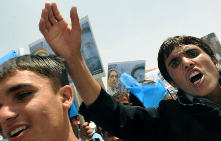 Supporters enthusiastically rallied for Afghan presidential candidate Abdullah Abdullah as they made their way to the street near the National Stadium following a rally in Kabul.