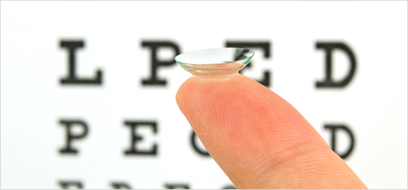 contact lens on fingertip