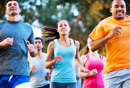 Photo of 5 Adults wearing fitness attire and running