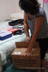 A resident begins to pack up essential items while she prepares to evacuate from New Orleans with her family as Hurricane Gustav approaches on August 29, 2008. (Jacinta Quesada/FEMA)