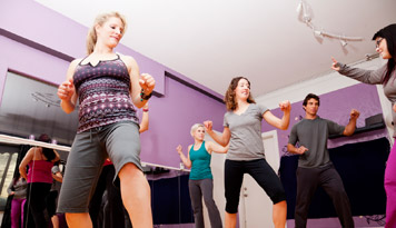 Photo of a group of people dancing in a dance class