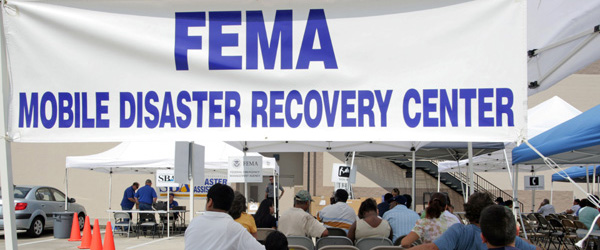 Picture of FEMA "Mobile Disaster Recovery Center" banner hanging up at a FEMA support site