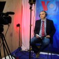 Photo: Alp Esmer of VOA Turkish Service broadcasts from the Skype studio.